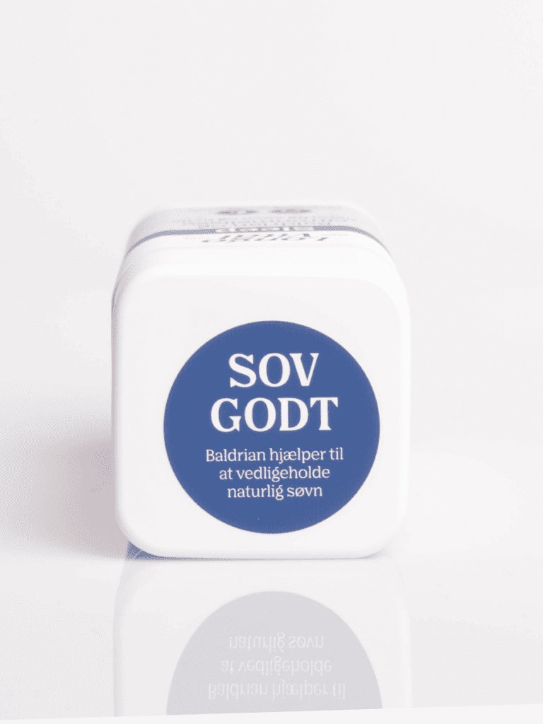Hvid beholder med blåt label SOV GODT, baldrian kosttilskud til naturlig søvn