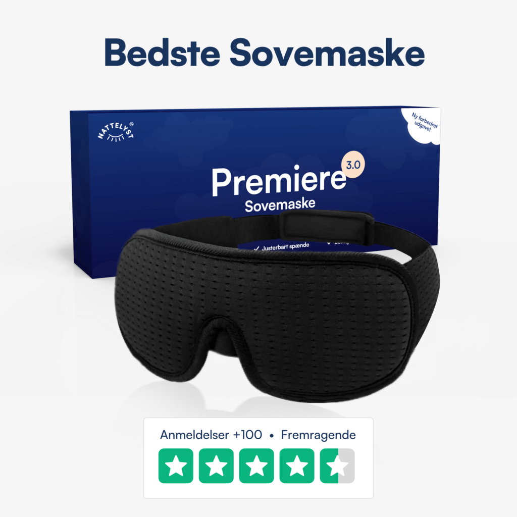 Sort Premiere sovemaske med blød justerbar rem foran blå emballage og femstjernet kundeanmeldelse
