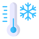 Termometer med lav temperatur og snefnugl, symbol på frost og koldt vejr